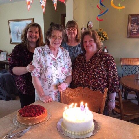 Woman standing with her children