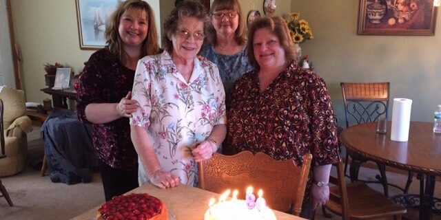 Woman standing with her children