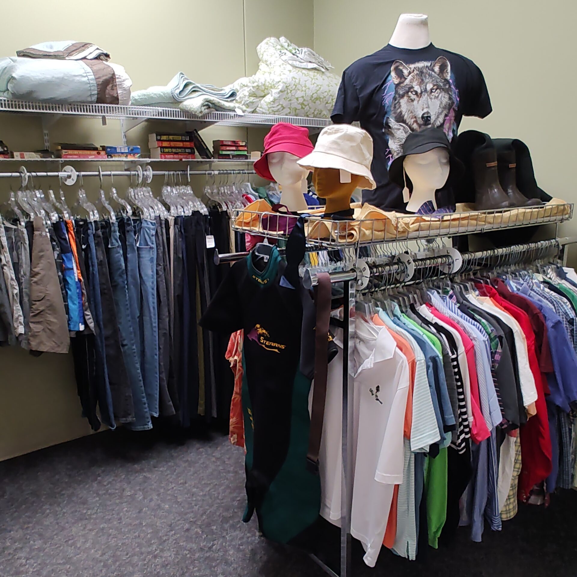 Mens clothing hanging on racks